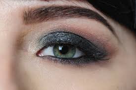 female eye and eyebrow with makeup close up