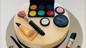 mac makeup cake with fondant toppers