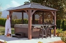Hot tub enclosures can be placed around the hot tub to protect it from the elements so that you can enjoy the hot water in privacy and comfort. Hot Tub Enclosures For Added Privacy Canadian Home Leisure