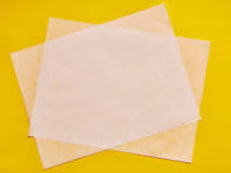 Is wax paper the same as parchment paper?