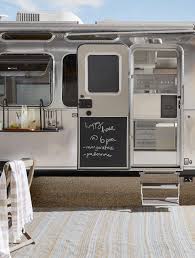 1 review ⬤ in stock. The Airstream X Pottery Barn Camping Trailer Is Like Summer On Wheels It Comes With The Coziest Bedding Curtains And Finishes It Even Flaunts An Outdoor Folding Table And Armchair Set To