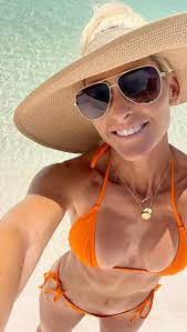 WWE legend Michelle McCool leaves little to imagination in tiny camo bikini  as fans say 'Undertaker is a lucky man' | The US Sun