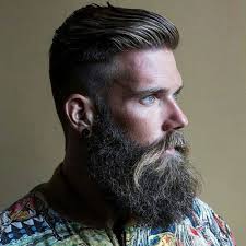 This men's hairstyle has a thick viking beard on the bottom that complements the neat sweep on top. Xr Joyiwnyozom