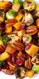 Pork tenderloin, rubbed with mustard, garlic, and ginger, is roasted then thinly sliced to be enjoyed at dinner with winter squash or other vegetables on the side; Thanksgiving Side Dish Roasted Brussels Sprouts Cinnamon Butternut Squash Veggie Dishes Vegetable Dishes Recipes