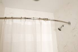 the pros and cons of curved shower rods
