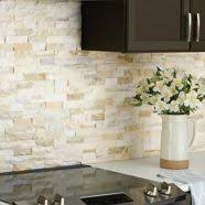 Our friend gave us a good lesson on how to install a kitchen backsplash. Tile Tile Accessories