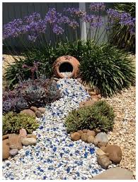 In a sloped yard, set them in tiered layers and trim them to different heights, giving them greater depth. 34 Gorgeous Front Yard Rock Garden Landscaping Ideas Vidur Net