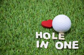 Premium Photo | Hole in one wording with golf ball