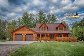 The log home also has a wrap around porch and cathedral ceilings in its design. 30 Beautiful Log Home Plans With Country Charm And Gorgeous Layouts