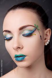 brunette with fantasy makeup in