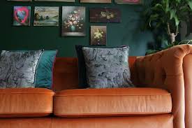 styling a marmalade orange velvet sofa