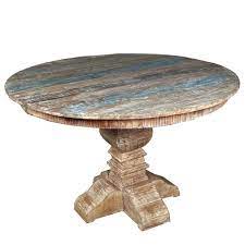 The beauty of round tables is everyone faces each other. French Quarter Rustic Reclaimed Wood Round Dining Table