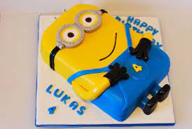 Easy to follow instructions to make a minion trim the tops off three of your cakes so they are flat and about equal depth and trim around the. Cake Mary S Cakes Minion Birthday Cake Minion Cake Minion Birthday Party