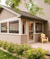 Glass enclosed porches or sunrooms bring the outdoors in while providing shelter from the elements. Scenix Retractable Screen Windows For Your Porch