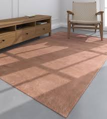 orange color wool solid tufted rug