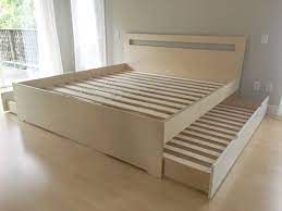 Bed With 2 Twin Size Trundle Beds