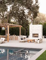 White Stone Patio Fireplace With Built