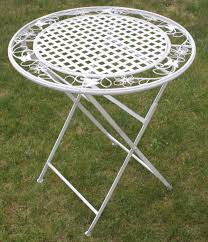 Shop for folding table garden online at target. Maribelle Rustic White Floral Round Folding Outdoor Garden Patio Dining Table Woodside Products