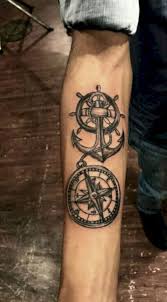 Anchor tattoos are not just popular among sailors and navy men but it has stepped out and became one of the most popular tattoo designs in the world. Compass Tattoos Meaning Fantastic Design Ideas Compass Tattoo Design Ideas Men Meaning Cool Forearm Tattoos Anchor Tattoo Design Tattoos For Guys