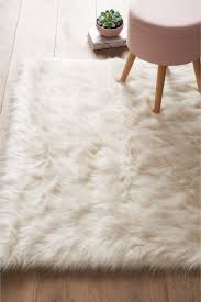 The collection features soft velvety feeling acrylic yarns that making it easy to get cozy and delightful. Buy Arctic Cosy Faux Fur Rug From The Next Uk Online Shop Faux Fur Rug Fur Rug Fur Rug Bedroom