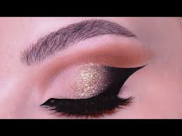 dramatic eyes with gold glitter for