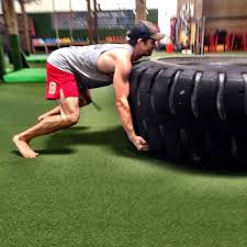 flipping a tractor tire in your workout