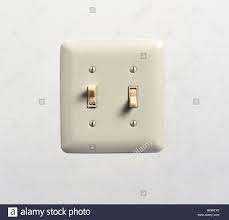 Close Up Of An Off White Electric Double Light Switch And Cover Plate Stock Photo Alamy