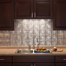 Such a bold wallpaper backsplash is a great idea to add color to a monochromatic kitchen. Fasade 18 25 In X 24 25 In Crosshatch Silver Traditional Style 4 Pvc Decorative Backsplash Panel B51 21 The Home Depot