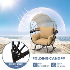 Tan Cushion And Folding Canopy