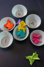 These instructions work without the printable, so if you're out of ink but still want to make a jumping frog, that's fine! Jumping Origami Frog Instructions