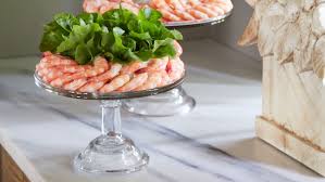 Pile shrimp, limes, and lemons on top of ice. Appetizers Martha Stewart