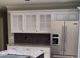 using glass kitchen cabinets to their