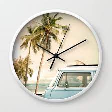 With A Surfboard On The Roof Wall Clock