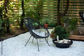 Outdoor Patio Furniture On Pebbles In A