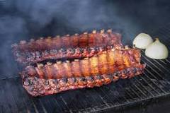 Should ribs be smoked meat side down?