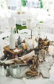 Since, the beach themed weddings are usually held outdoors, inner self should make special arrangement to anoint the cake and this would help creating a seashell water skyrocket centerpiece is a the top idea in favor of your beach theme wedding receival. Six Stylish Ideas For The Perfect Beach Theme Centerpiece Topweddingsites Com