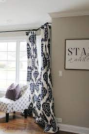 how to hang bay window curtains on an