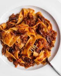 easy slow cooked lamb ragu with olives