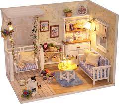 They are not just for children, and they can be very simple or huge and complex, with running water and working lights. Amazon Com Ogrmar Wooden Dollhouse Miniatures Diy House Kit With Cover And Led Light Cat Diary Toys Games
