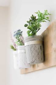 Anyway, do you guys remember in last week's post of our living room i shared a little peek of that cute diy wooden wall planter? Learn How To Make Your Own Diy Mason Jar Wall Planter