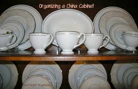 how to arrange a china cabinet