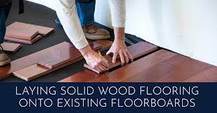 laying solid wood flooring onto