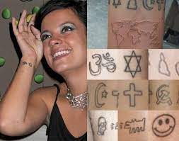 She started on the inside of her wrist with seven symbols — five to represent different major world religions along with a communist symbol and, oddly enough, homer simpson's head. 20 Cute Tiny Celebrity Tattoos Star Tattoo On Wrist Celebrity Tattoos Tiny Tattoos