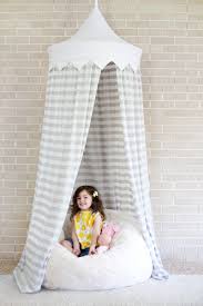 Kids love canopy beds with curtains because they form a hideout or private space. Hula Hoop Tent Tutorial A Beautiful Mess