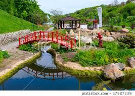 Gazebo By A Pond In Japanese Garden