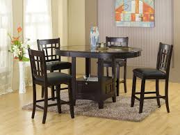 Its round tabletop accommodate more people. Pub Table 4 Chairs D220 Table 4 Dining Room Groups Price Busters Furniture