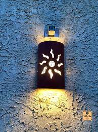 Dancing Sun Outdoor Ceramic Wall Sconce