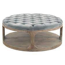 Whether used as an ottoman or coffee table, this tufted cocktail ottoman is an upgrade for any space. Marie French Country Round Grey Blue Tufted Wood Round Coffee Table 41 W 50 W Kathy Kuo Home