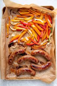 My family has been using this very simple and delicious recipe for sausage, peppers, and onions for years and years now. Oven Sausage Peppers And Onions Sheet Pan Meal Modern Crumb
