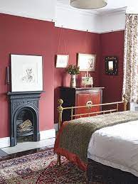 Red Walls Victorian Bedstead Bedroom